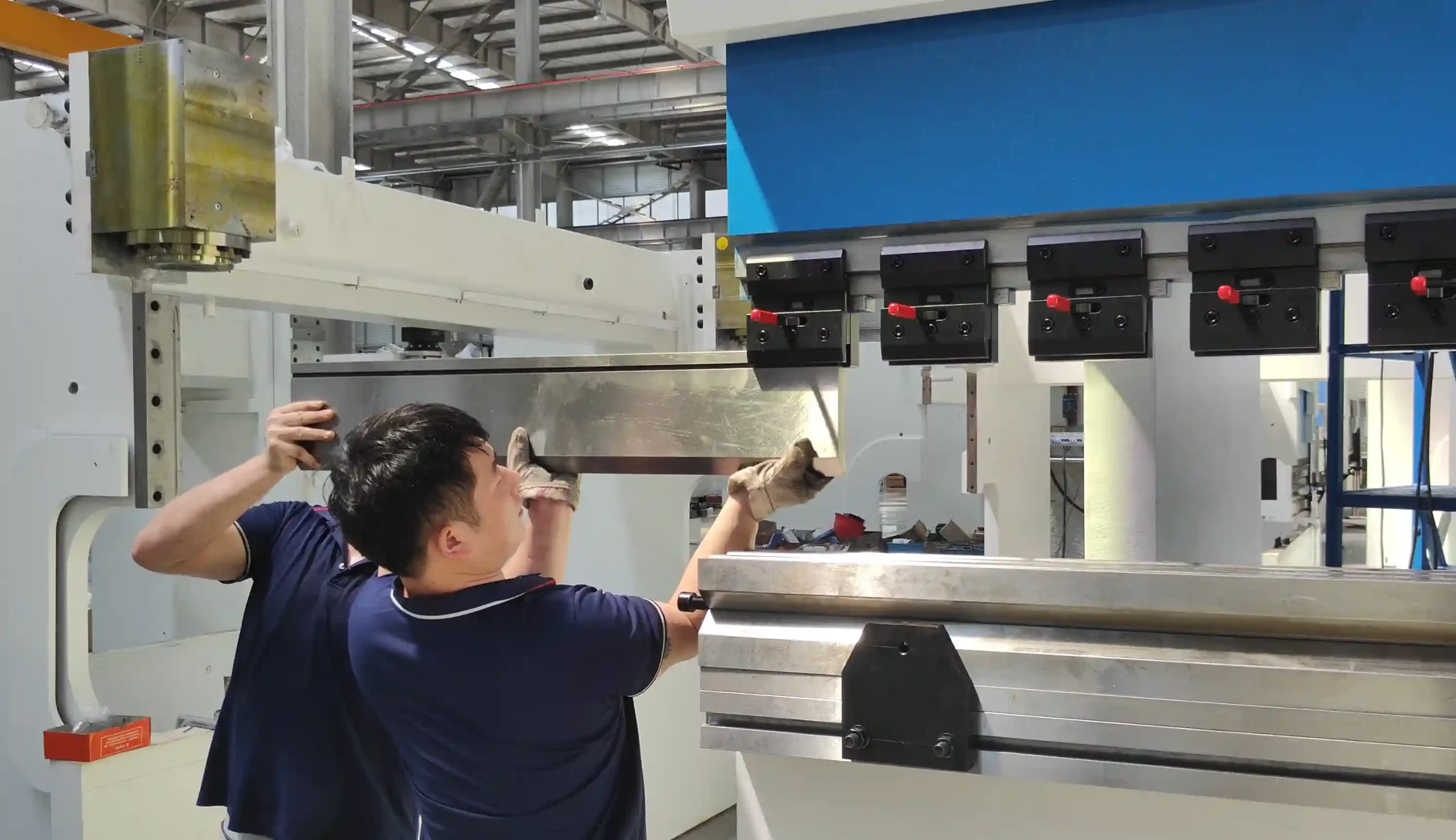 Safe press brake tooling changeover using assisted storage and loading system