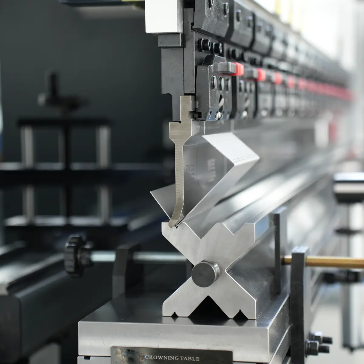 Standard L-shaped sheet metal bracket bent with a straight press brake punch