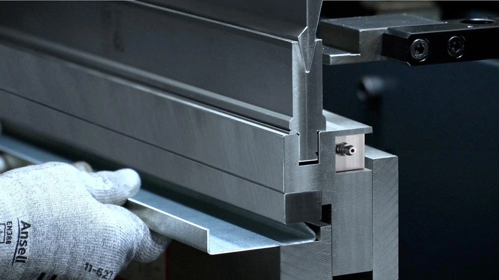 Hemmed sheet metal edge formed with a 30 degree acute press brake punch